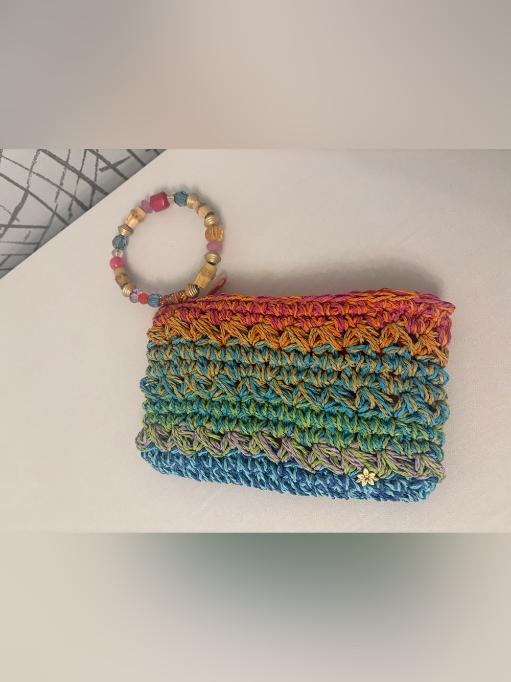 Cappelli Straworld colorful crochet straw clutch With  beaded  bracelet handle.